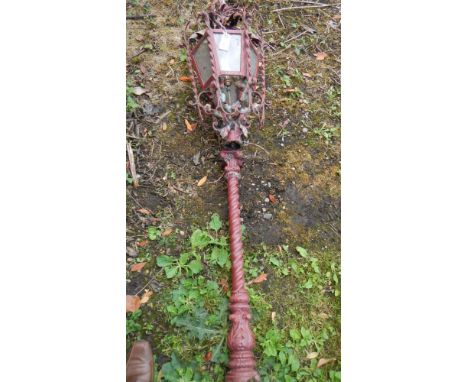 An old Victorian cast iron lamp