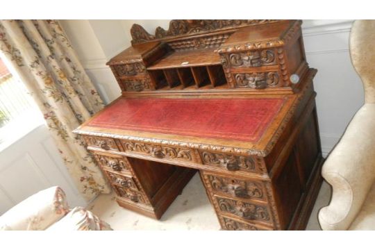 A 19th Century Carved Oak Double Pedestal Desk A 19th Century Carved Oak Double