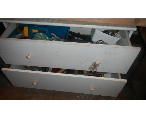 A white chest and tools,