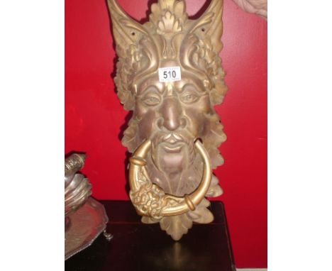 A large Green Man door knocker