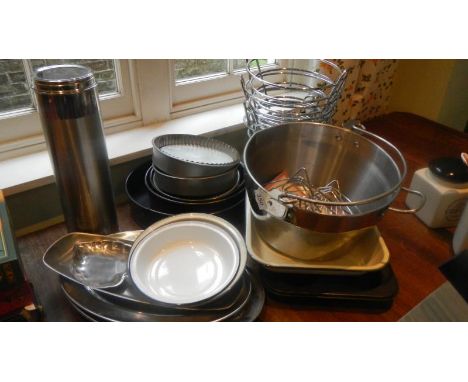 A jam pan, enamel dishes, cake tins, stainless steel trays etc.,