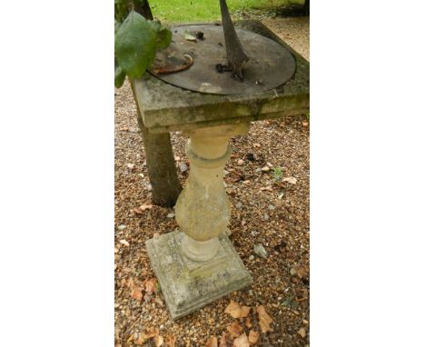A sundial on pedestal.