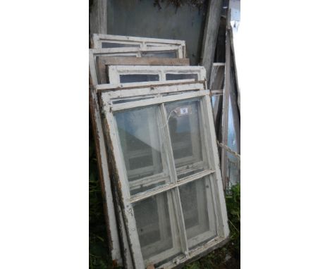 A quantity of sash windows some with fittings