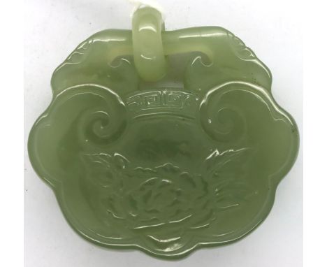 Chinese carved celadon green jade fidelity lock, decorated with flowers, W: 5cm, H: 45 mm. P&amp;P Group 1 (£14+VAT for the f