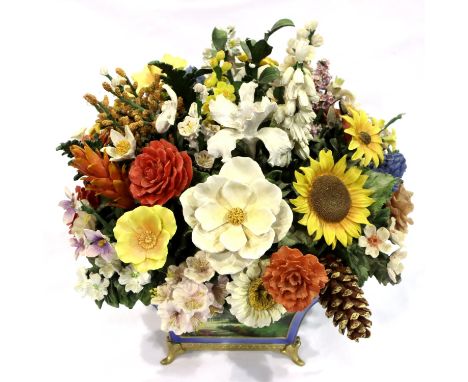 Bradford Exchange ceramic flower display, H: 24 cm and fifty flower state guides, some losses to petals. Not available for in