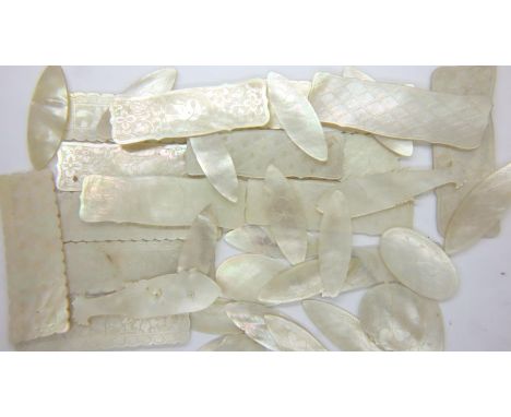 Thirty five antique mother of pearl Oriental gaming tokens decorated with fish, birds and flowers. P&amp;P Group 1 (£14+VAT f