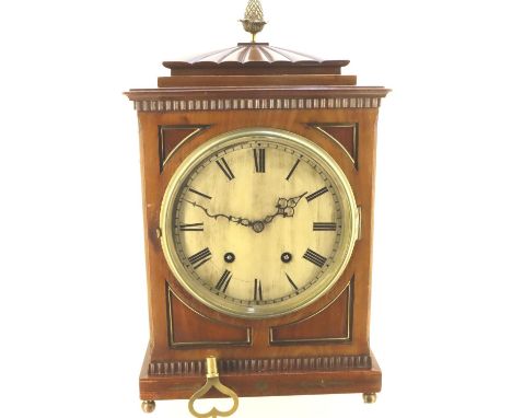 Regency period walnut cased bracket clock, the silvered dial displays Roman chapters, the chiming German mechanism enclosed w