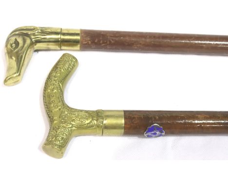 Two brass handled walking sticks. P&amp;P Group 3 (£25+VAT for the first lot and £5+VAT for subsequent lots) 