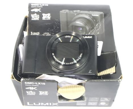 Panasonic Lumix DMC-LX15 digital camera, boxed with instructions, box is damaged. P&amp;P Group 1 (£14+VAT for the first lot 