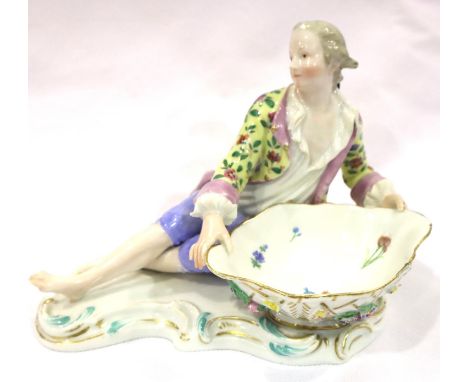 19th century Meissen figure in recumbent pose holding a bowl, L: 17 cm, very minor losses to applied flowers and thumb. P&amp