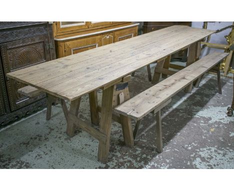 TRESTLE TABLE, vintage rectangular planked pine on trestle supports, 304cm x 68cm x 79cm H together with two similar benches.