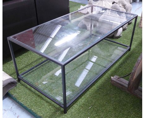 LOW TABLE, with glass top and shelf below, on a black metal frame, 110cm x 55cm x 42cm H.