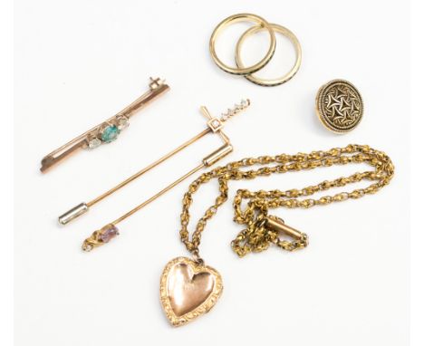 A yellow gold metal stick pin, the terminal set with five diamonds, a stick pin set with amethyst, gilt metal heart shape loc