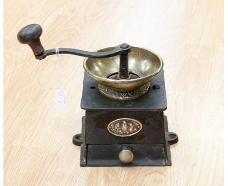 An original cast iron and brass 19th Century coffee grinder, a Kendrick and Sons patent coffee mill No. 2, possibly North Ame