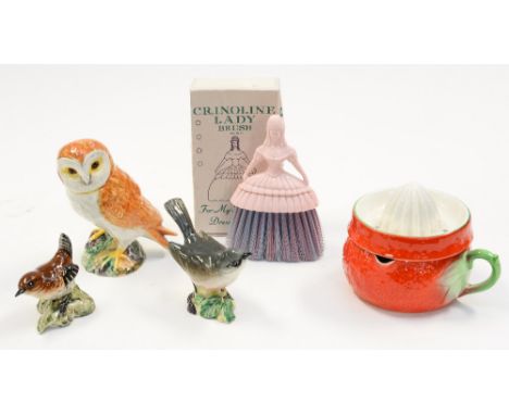 A collection of Beswick including birds and a lemon squeezer 401, together with a Crinoline Lady dressing table brush, in ori