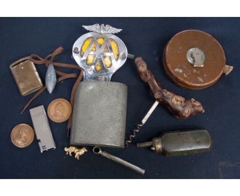 A powder flask, snuff box, J.H. Ashton Ltd, AA Badge, medallions, etc, parcel lot 