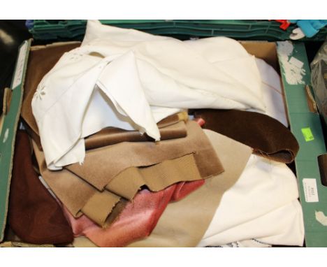 A mixed lot of textiles to include fabric, tablecloths, embroidery, etc 
