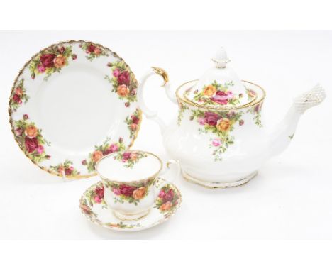 Royal Albert 'Country Roses' tea service with teapot, two milk jugs, sandwich plate, side plates and dessert plates (29) 