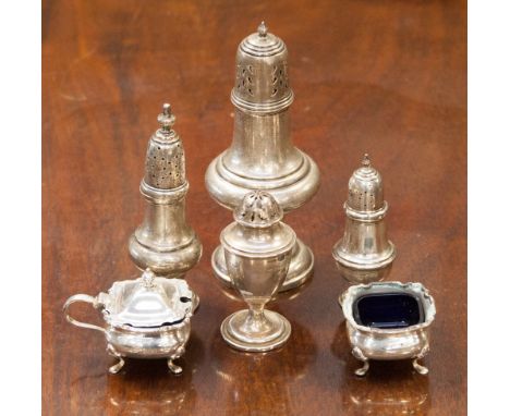 A quantity of silver condiments to include three casters, a silver sander, a mustard and salt pot, all with Birmingham and Ch