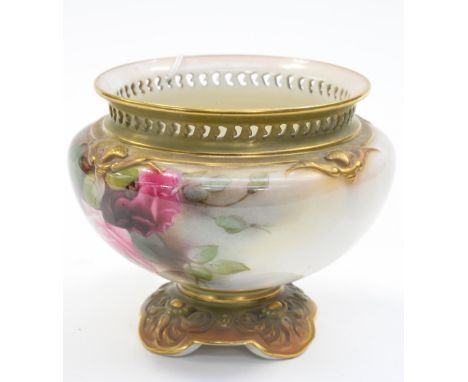 A Royal Worcester rose bowl with pierced rim, hand painted with pink roses, buds and foliage, green and gilt rims, shape no. 