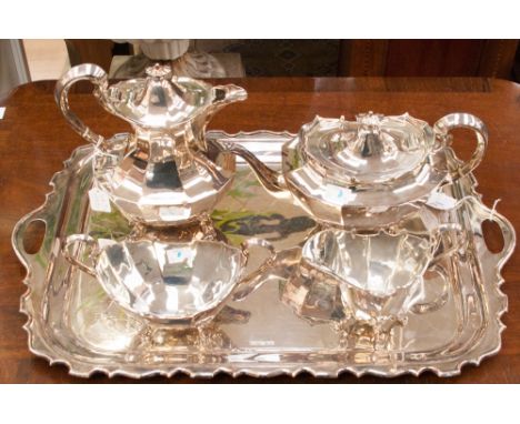 An exceptional George V sterling silver five piece tea service of significant gauge to include, tea pot, hot water jug, sugar