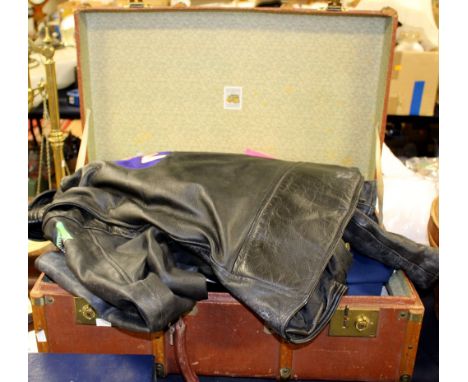 A trunk of vintage clothes to include an 1980s gentlemen's leather biker jacket with 'pin up' motif and tiger motifs, a royal