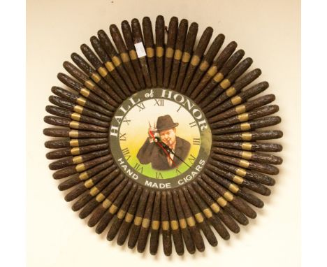 A Hall of Honor hand made cigars wall clock; Churchill portrait to centre of clock face, surrounded by fan of cigars 
