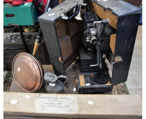 A boxed Kodascope Model EE projector, boxed accompanying screen, a copper warming pan and pewter jug (4)