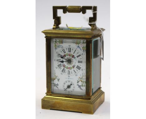 A French brass carriage alarm clock, the enamelled dial with floral sprays and garlands and subsidiary alarm setting dial, ma