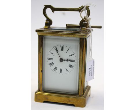 A brass corniche cased carriage clock (key) 