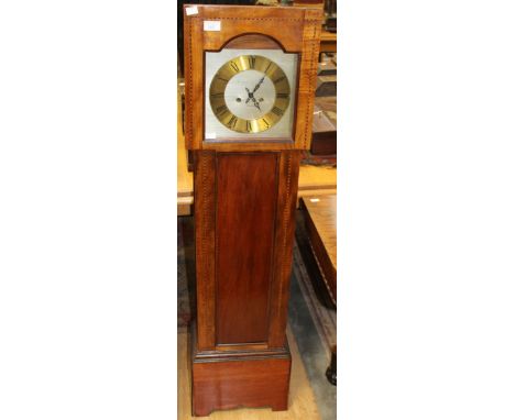 A granddaughter clock, circa 1920s, The London Clock Company, brass dial, Roman numerals, case with geometric inlay, with key