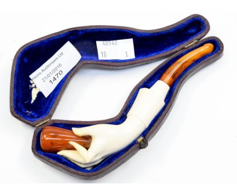 An ivory and amber smoker's pipe in blue velvet case 