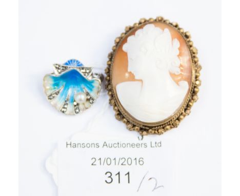 A cameo brooch, carved shell, gold plate on brass frame together with a German enamel and cultured pearl and marcasite brooch