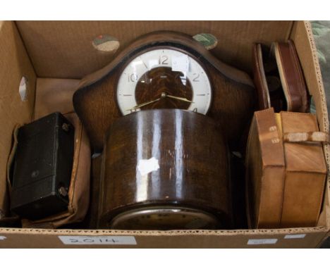 A Smiths 1940s mantle clock, an early 20th Century mantle clock, mirror leather collar box and leather/bakelite grooming case