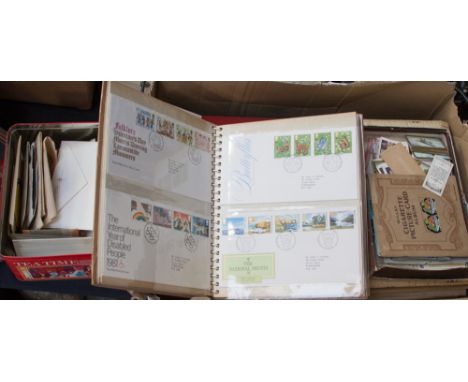 A box of stamps, first day covers in albums, tin of assorted, etc