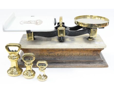 A set of chemist scales with weights, H King & Son, 23 North Cross Road, East Dulwick