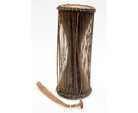 Tribal interest: an early 20th Century African (Nigerian) drum and primitive stick, string surround to drum (2) 