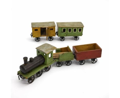 Alte Holzeisenbahn mit Eisengussrädern.             Farbig bemaltes Holz, Eisen. L 10 - 20 cm.             Lok, Tender und 3 