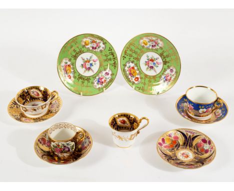 A pair of Rockingham green-ground side plates, a Spode trio painted and gilt with vine and flowers, a Davenport coffee cup an