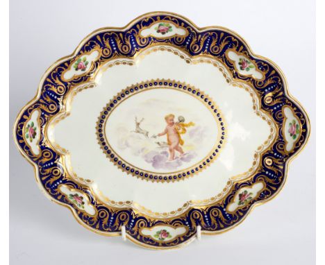 A Derby lobed oval dish, circa 1800, painted to the centre with a cherub and hounds hunting a stag, perhaps by Richard Askew,
