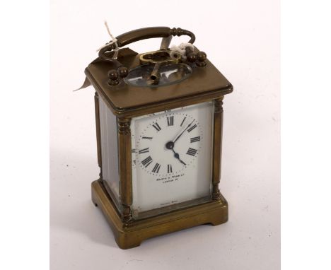 A gilt brass cased carriage clock, the dial signed Mappin &amp; Webb Ltd., fitted a French movement, 15cm high (handle up)