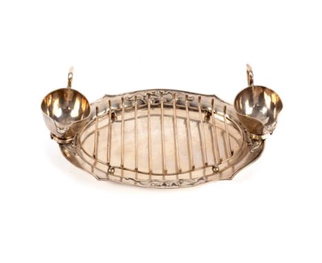 A Chinese export silver asparagus tray with sauce boats, Zee Sung, Shanghai, the shaped oval tray with raised scrolling decor