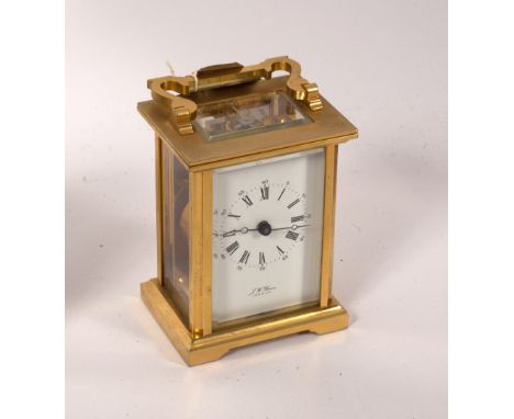 A gilt brass cased carriage clock, the white enamel dial signed JW Benson, London, the dial signed Bornand Freres, 14.5cm hig