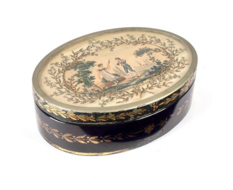 A 19th Century blue glass box with print of a young couple to the cover in a border of thread work and sequins, oval, 17cm wi