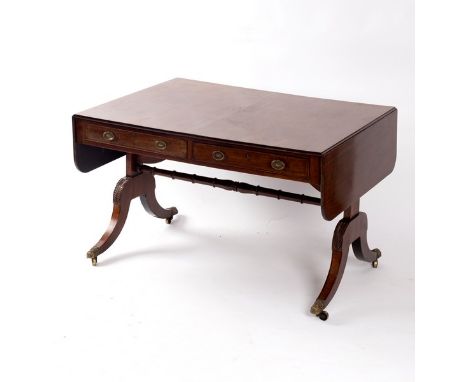 A Regency mahogany sofa table, two drawers to each side, on end supports with outswept legs, 166cm wide flaps up