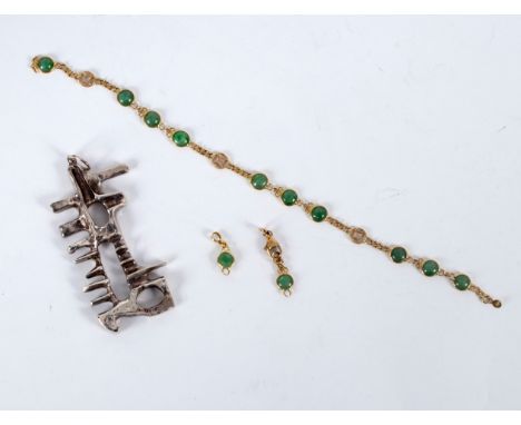A modernist Maltese silver pendant, .917 standard and a jade set 18k gold bracelet (damaged)