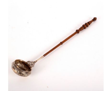 A Scottish silver toddy ladle, J Muir jnr, Glasgow 1837, the bowl embossed flowers and foliage with floral support, having a 