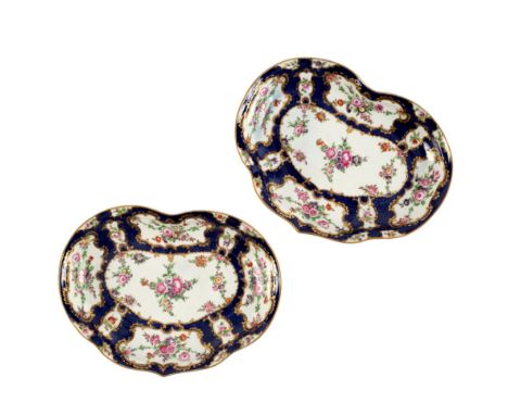 A pair of Worcester blue scale ground kidney-shaped dishes, circa 1770, with floral panels, 26cm diameter/see illustration CO