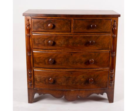 A Victorian mahogany bowfront chest of two short and three long drawers, with shaped apron beneath on bracket feet, 113cm wid