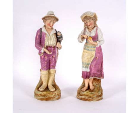 A pair of French biscuit porcelain figures, circa 1860, she peeling an orange, he with a magic lantern strapped to his back a